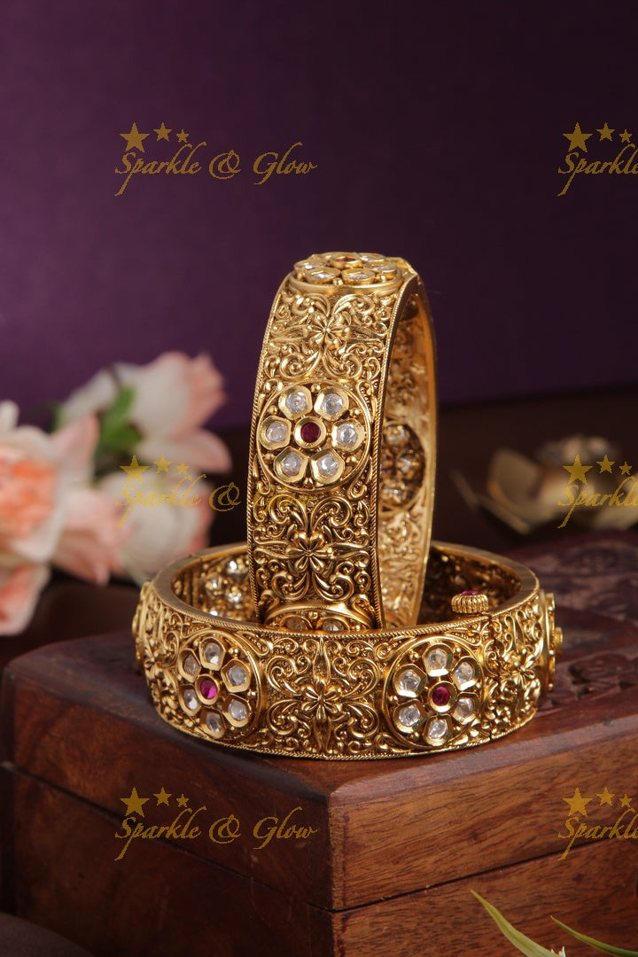 Gold alike intricate kundan stone bangle