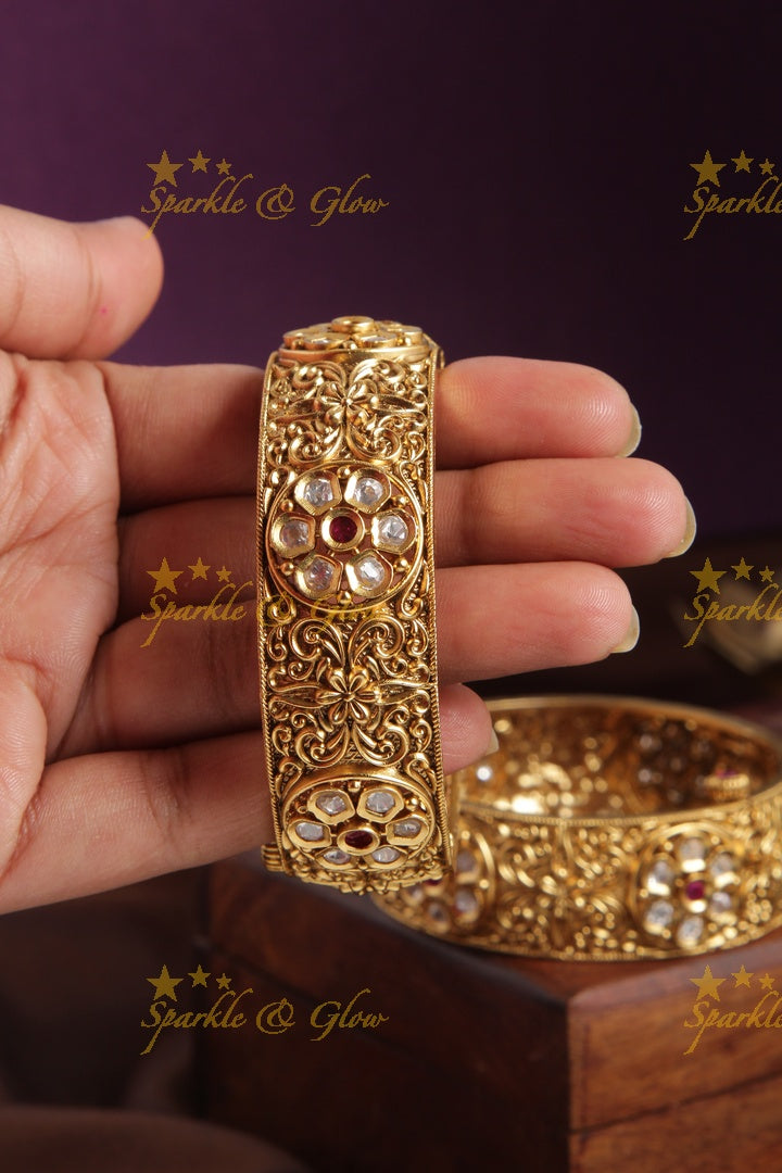 Gold alike intricate kundan stone bangle