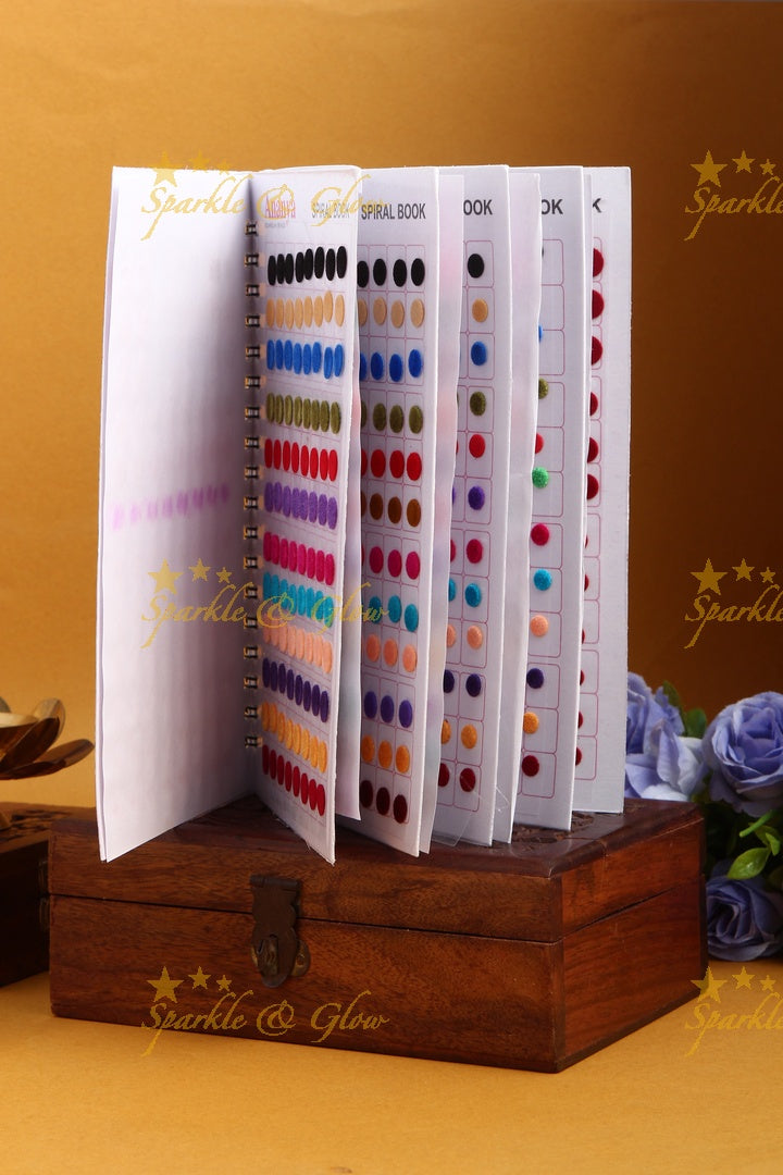 Ananya plain with different sized round bindi spiral book in assorted colour