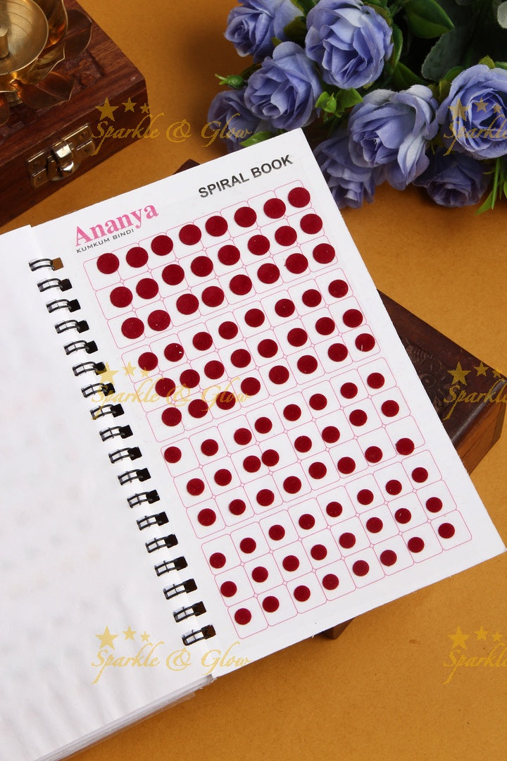 Ananya plain with different sized round bindi spiral book in assorted colour
