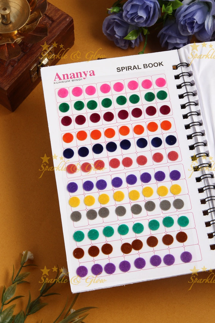 Ananya plain with different sized round bindi spiral book in assorted colour