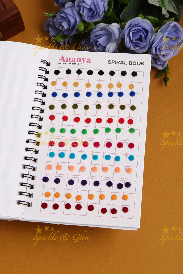 Ananya plain with different sized round bindi spiral book in assorted colour