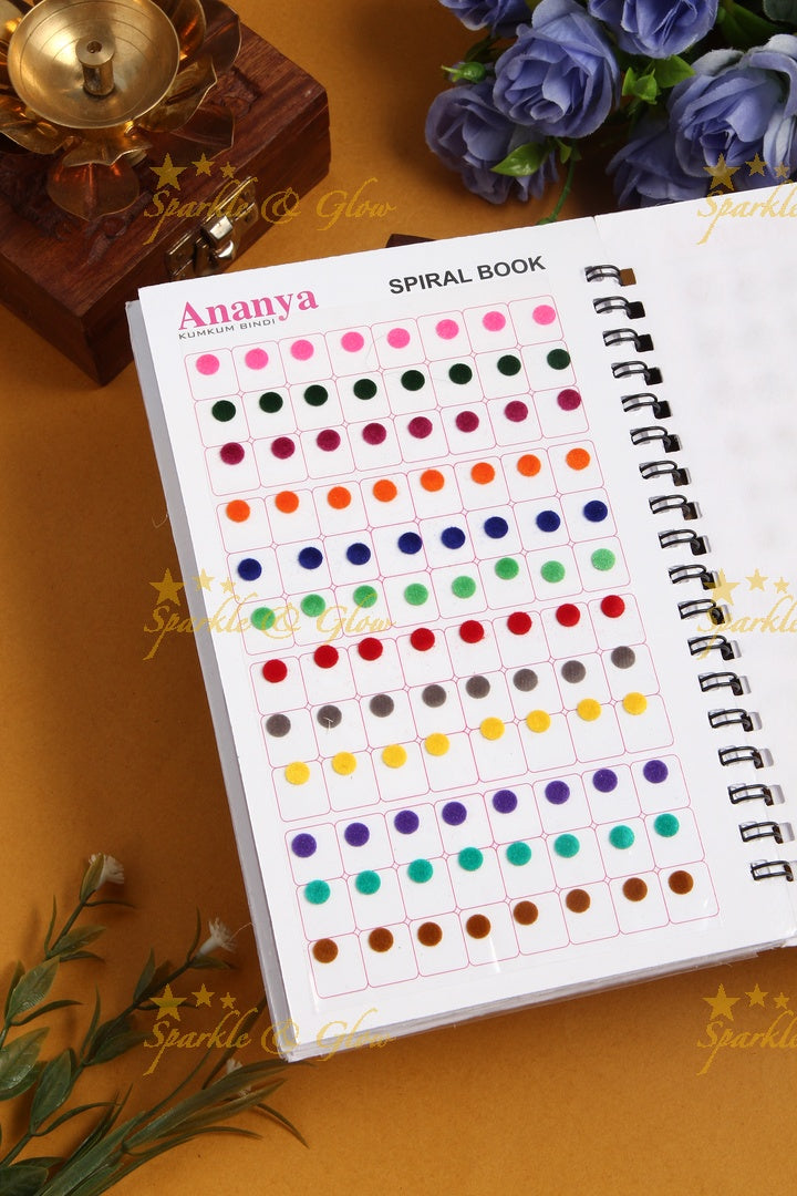 Ananya plain with different sized round bindi spiral book in assorted colour