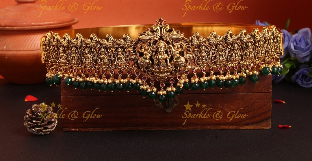 Intricately carved lakshmi elephant peacock hipbelt with green beads