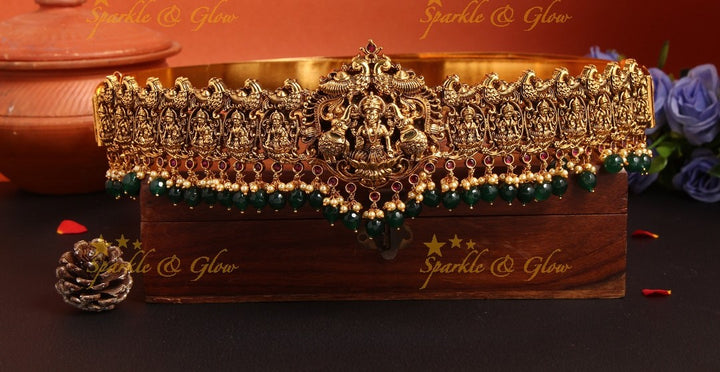 Intricately carved lakshmi elephant peacock hipbelt with green beads