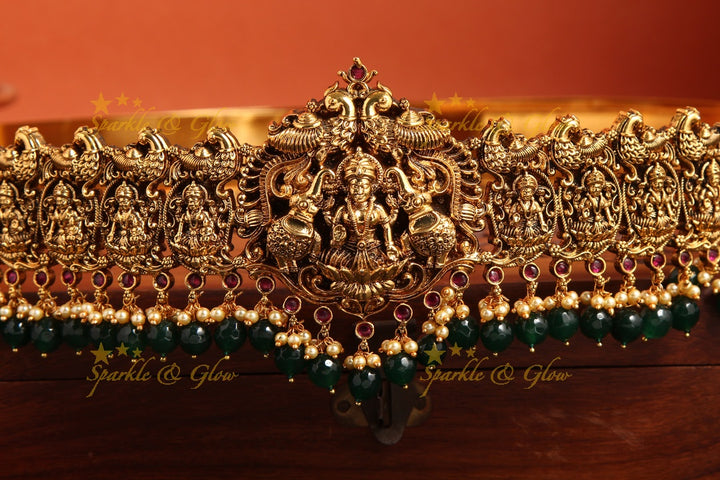 Intricately carved lakshmi elephant peacock hipbelt with green beads