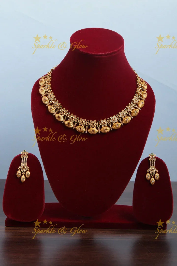 Gold alike Floral eye shaped necklace - Sparkle and Glow