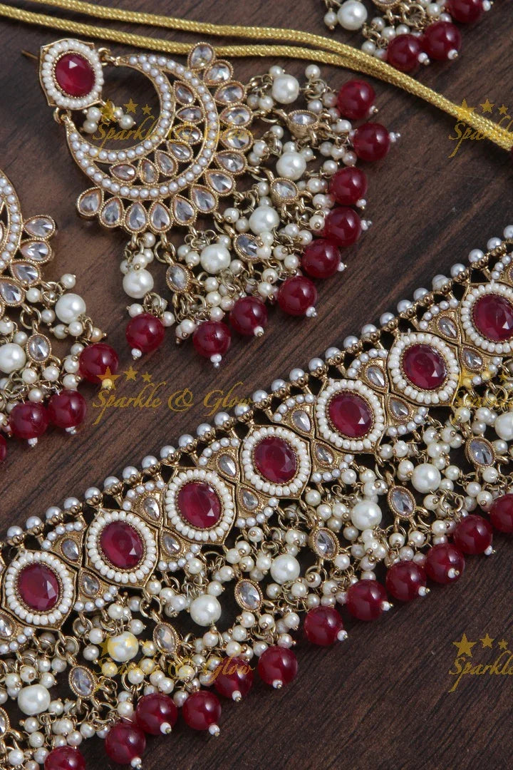 Beautiful Stone Pearl choker Necklace with Chandbalis and Maang Tikka - Maroon - Sparkle and Glow