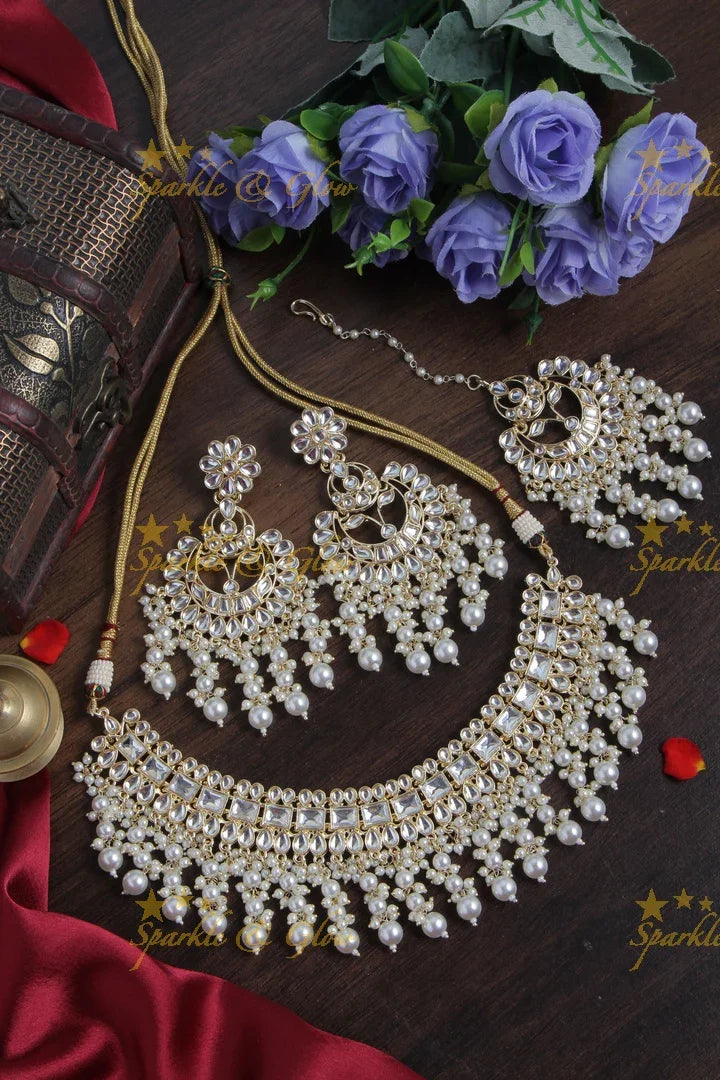 Beautiful Pearl stone necklace with floral studded earrings and maang tikka - Pearl - Sparkle and Glow