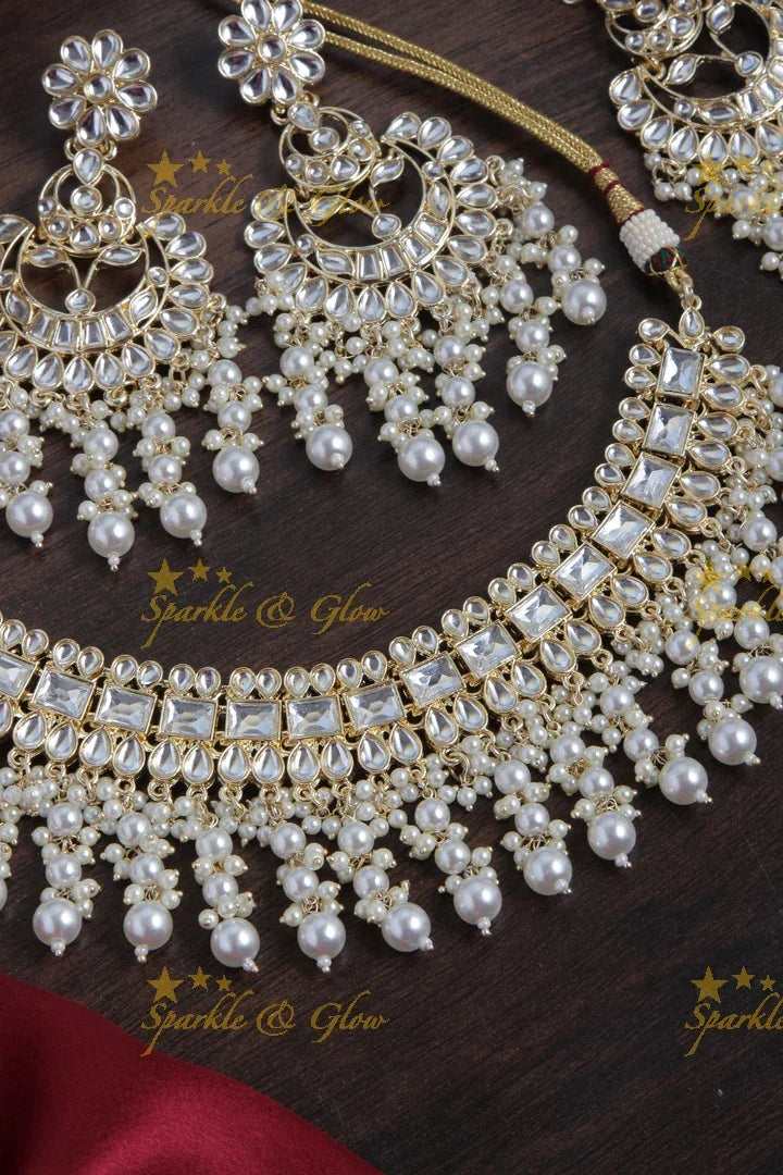 Beautiful Pearl stone necklace with floral studded earrings and maang tikka - Pearl - Sparkle and Glow