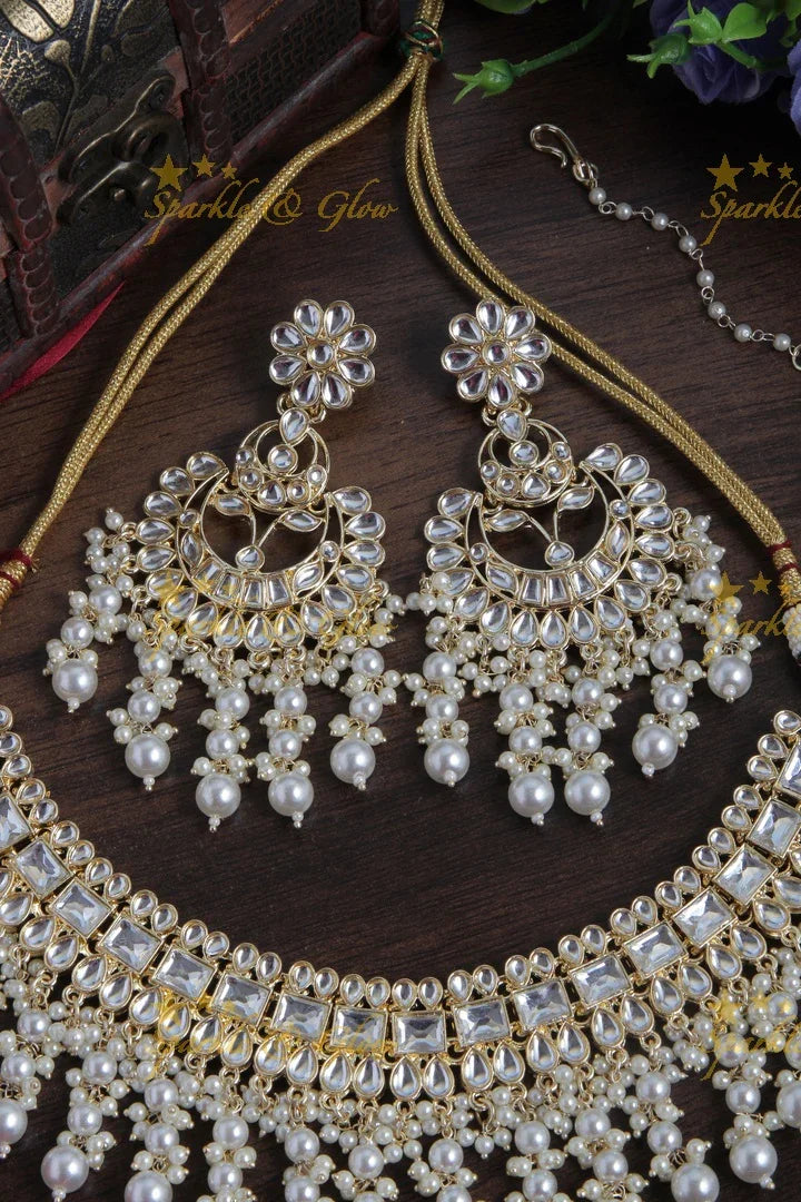 Beautiful Pearl stone necklace with floral studded earrings and maang tikka - Pearl - Sparkle and Glow