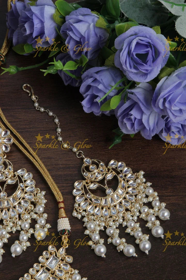 Beautiful Pearl stone necklace with floral studded earrings and maang tikka - Pearl - Sparkle and Glow