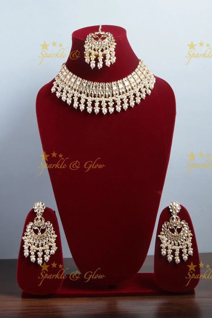 Beautiful Pearl stone necklace with floral studded earrings and maang tikka - Pearl - Sparkle and Glow