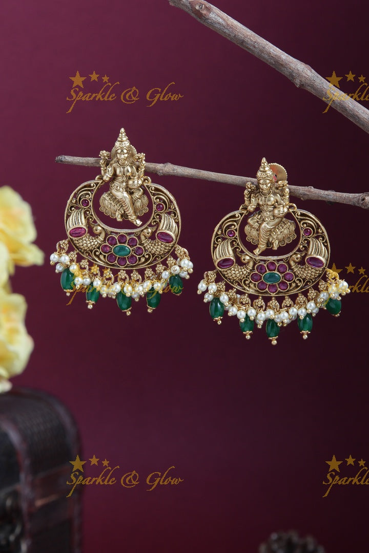 Intricately Carved Lakshmi Floral Peacock Chandbalis