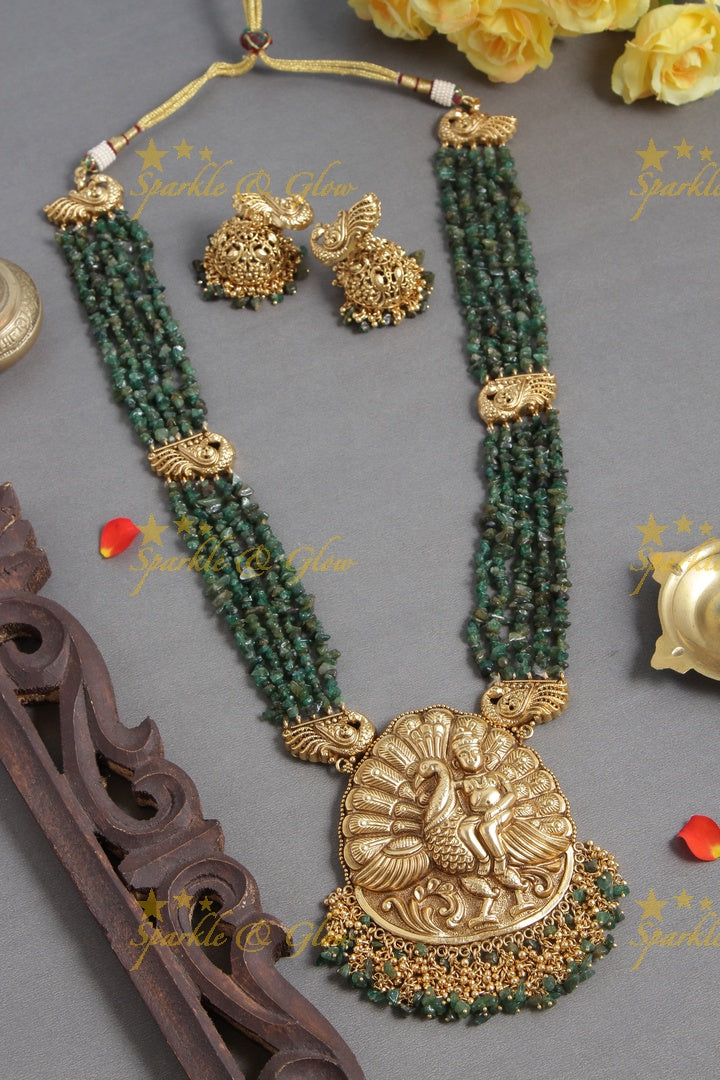 Gold Alike bead necklace with intricately carved peacock pendent