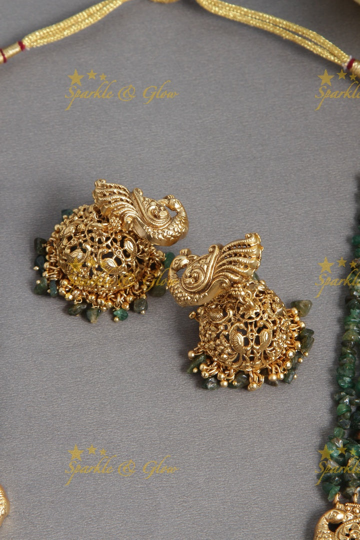 Gold Alike bead necklace with intricately carved peacock pendent