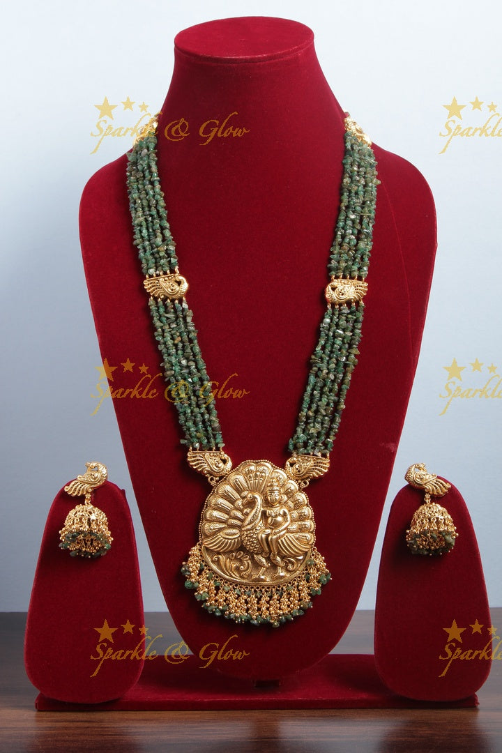 Gold Alike bead necklace with intricately carved peacock pendent