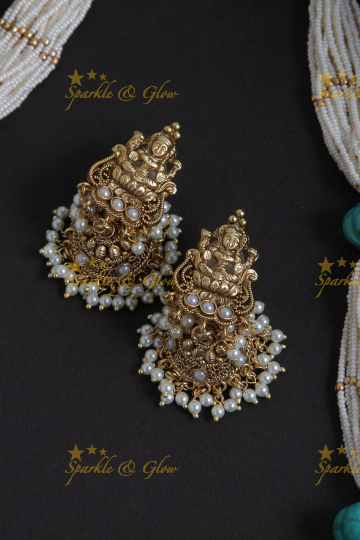 Beautiful Gold Alike bead necklace with intricately carved lakshmi ganesh pendent