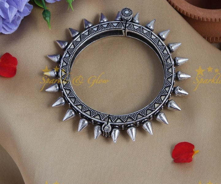 Silver look alike triangle design hook type screw bangle