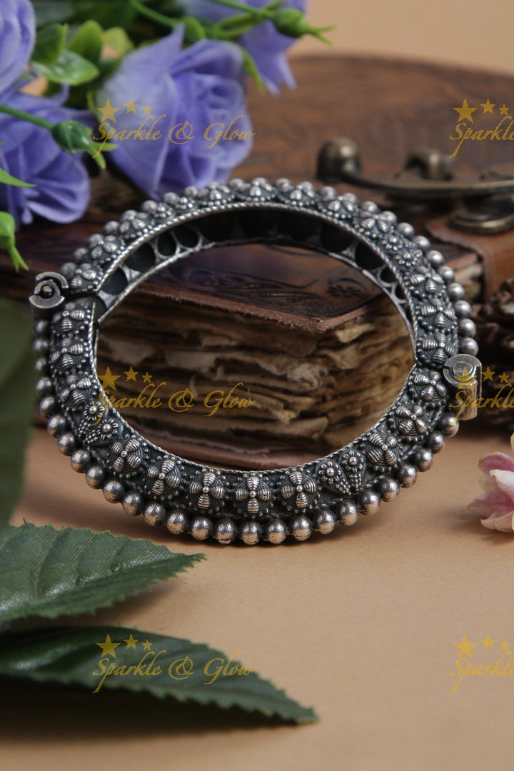 Divine Silver look alike floral round design openable bangle
