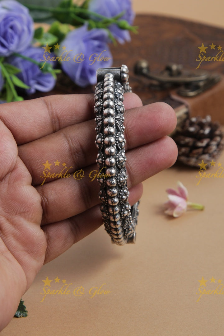 Divine Silver look alike floral round design openable bangle