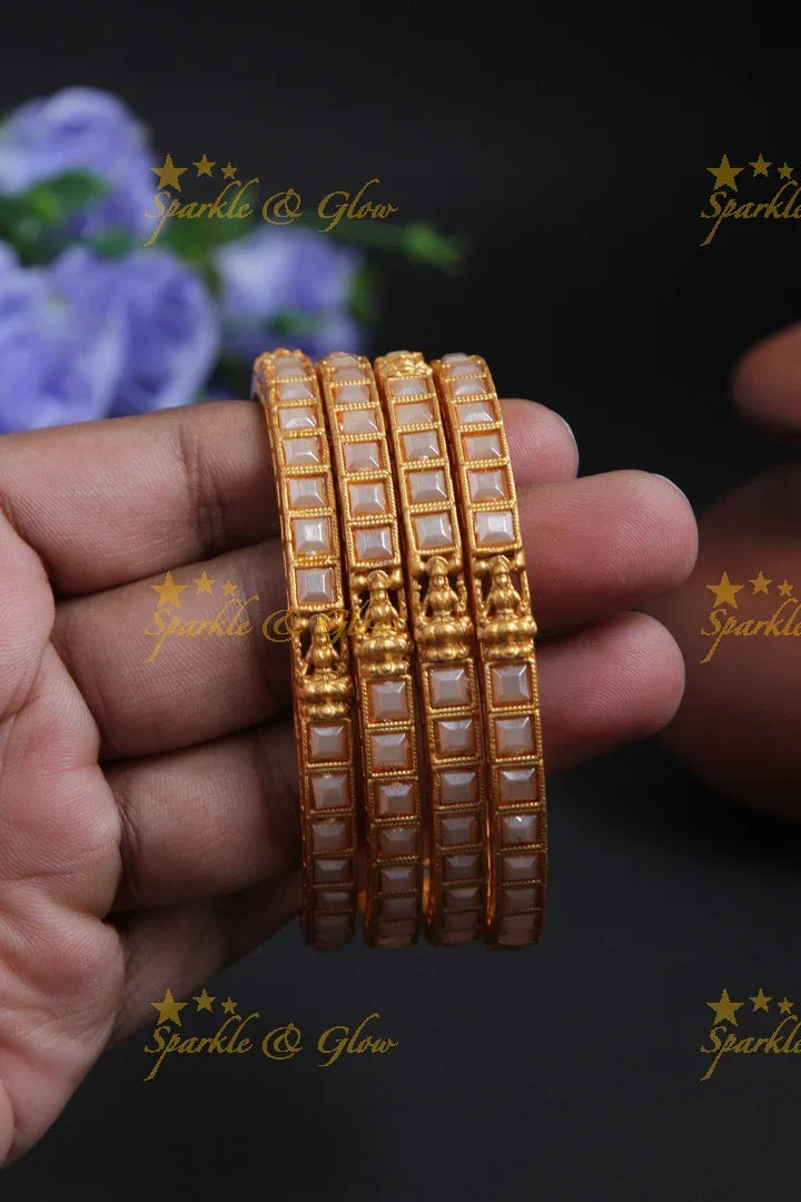 Budgetted pearl bangles set of 4 - 2.4 - Sparkle and Glow