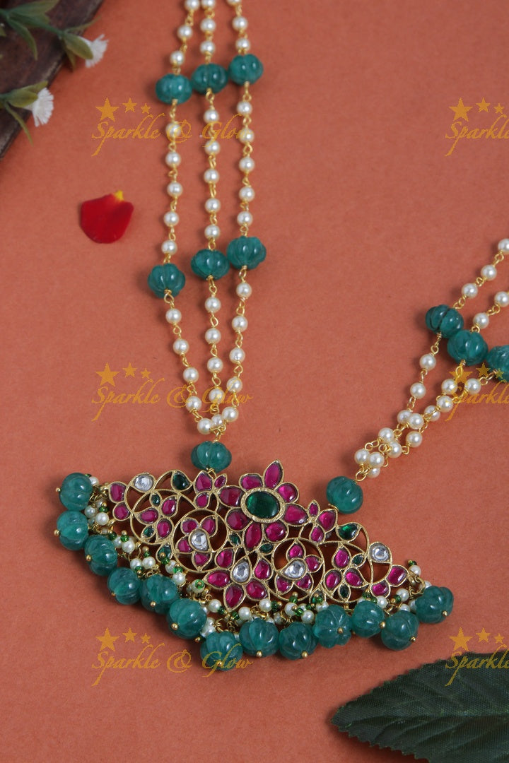 jadau kundan peacock pendent chain with pearl and green pumkin beads