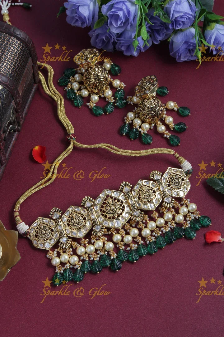 Intricately carved ganesh bead choker with pearls and green leaf beads - Pink - Sparkle and Glow
