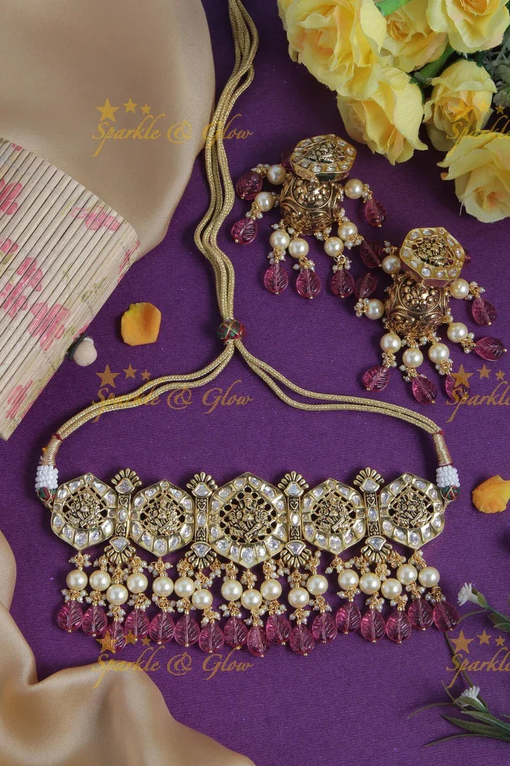 Intricately carved ganesh bead choker with pearls and green leaf beads - Pink - Sparkle and Glow
