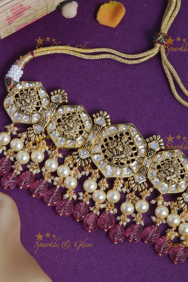 Intricately carved ganesh bead choker with pearls and green leaf beads - Pink - Sparkle and Glow