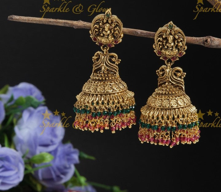 Intricately carved lakshmi studded jhumkas