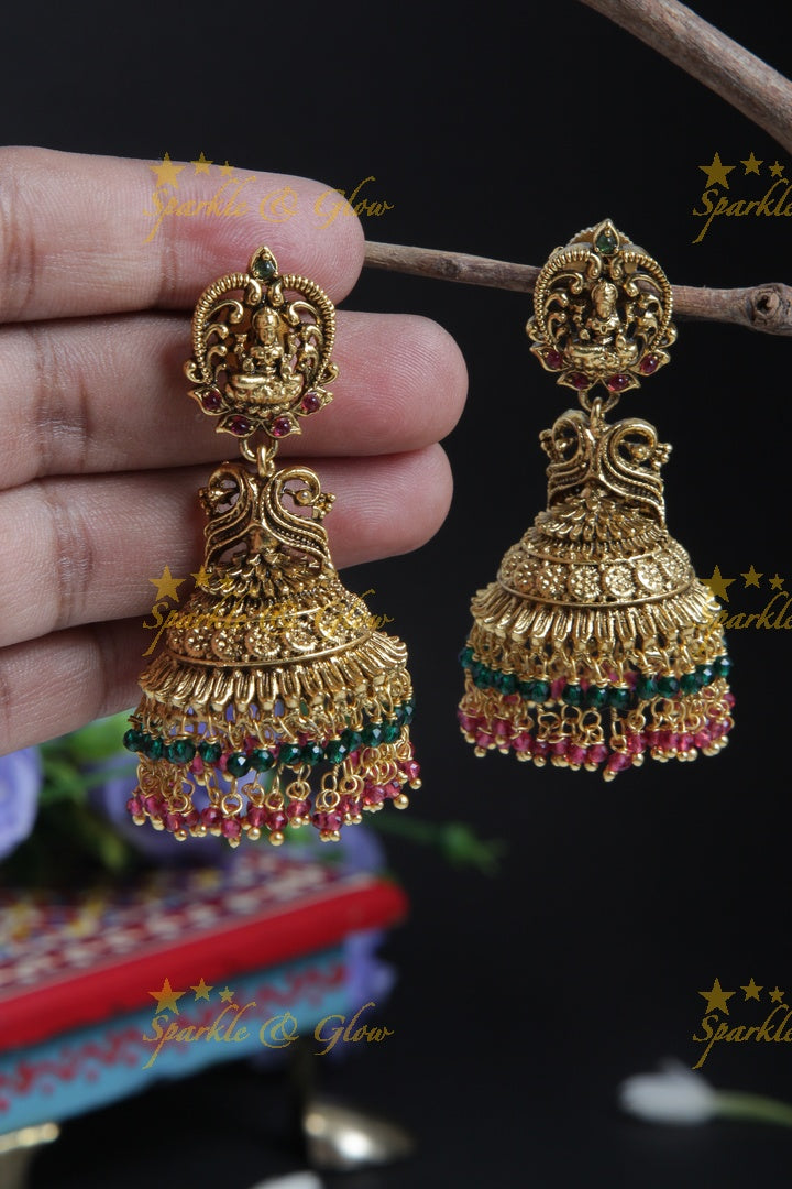 Intricately carved lakshmi studded jhumkas