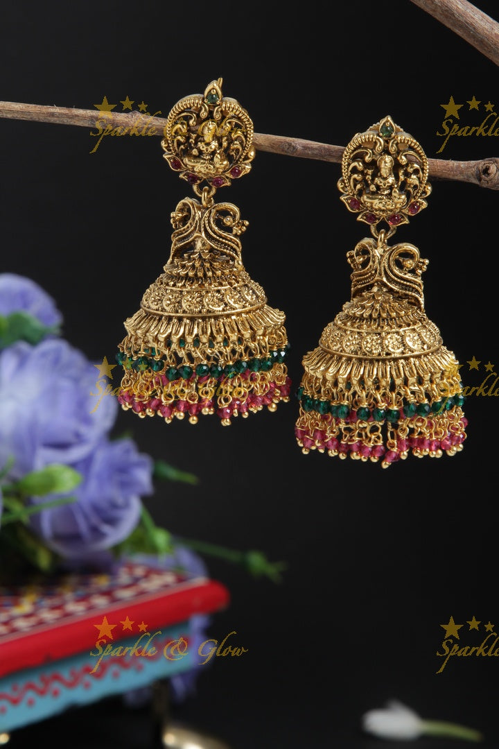 Intricately carved lakshmi studded jhumkas