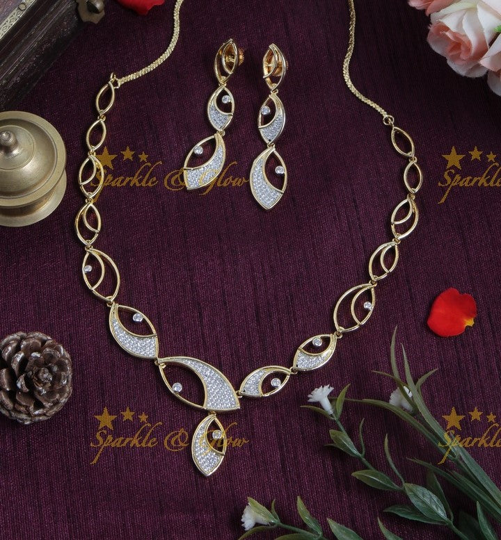 Intricate eye design Gold finish AD stone short necklace