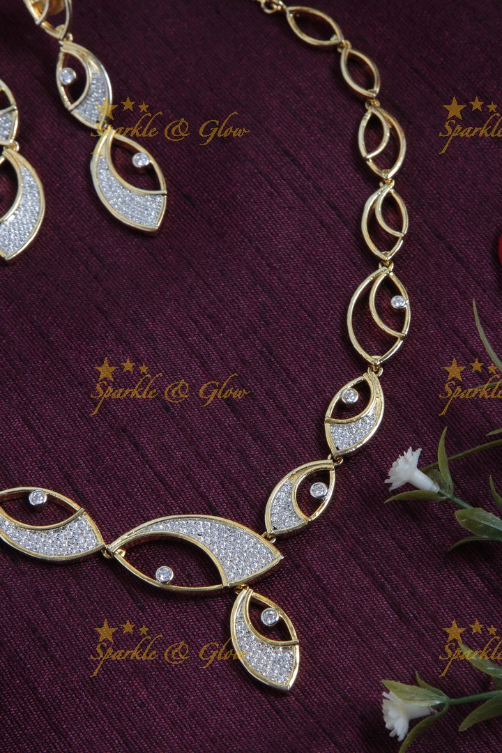 Intricate eye design Gold finish AD stone short necklace