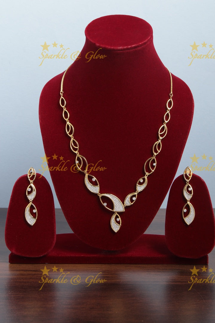 Intricate eye design Gold finish AD stone short necklace