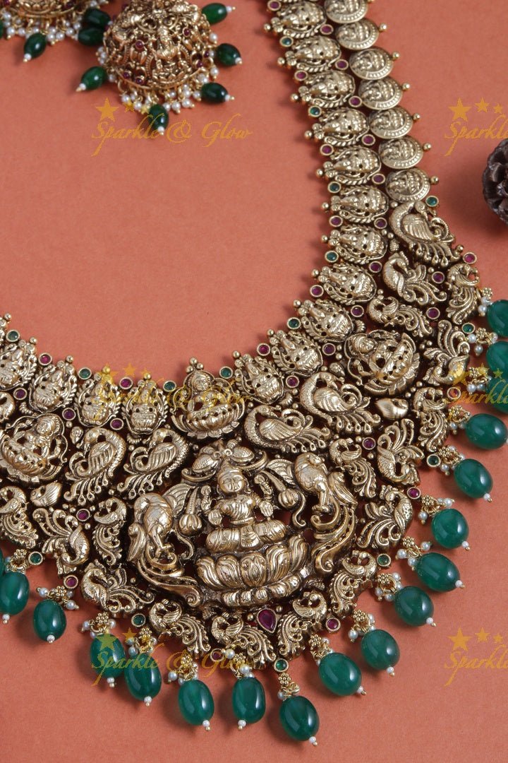 Gold alike bridal grand lakshmi carved long necklace with green beads - Sparkle and Glow - Back Thread - 