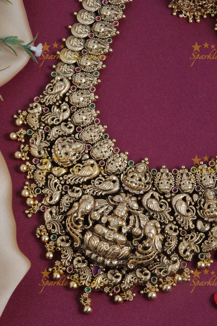 Gold alike bridal grand lakshmi carved long necklace with gold beads - Sparkle and Glow