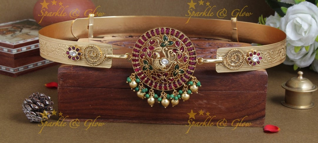 Intricately carved peacock pendent with plain hipbelt
