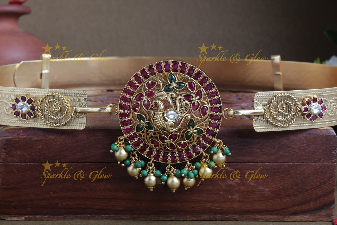 Intricately carved peacock pendent with plain hipbelt
