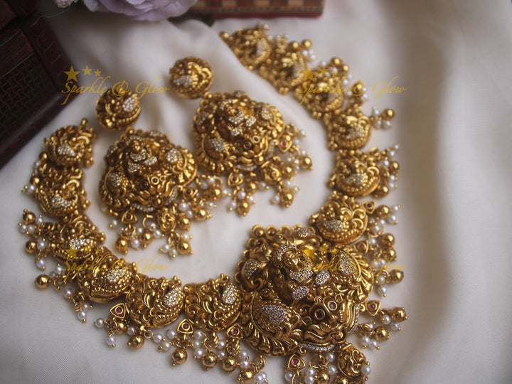 Gold alike peacock style necklace with Lakshmi pendent and gold beads