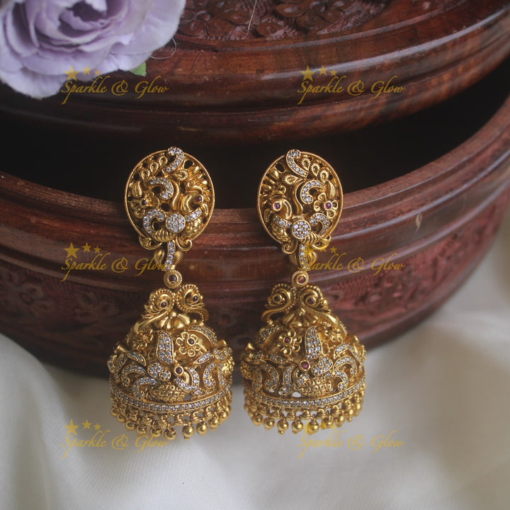 Gold alike intricate design floral jhumkas