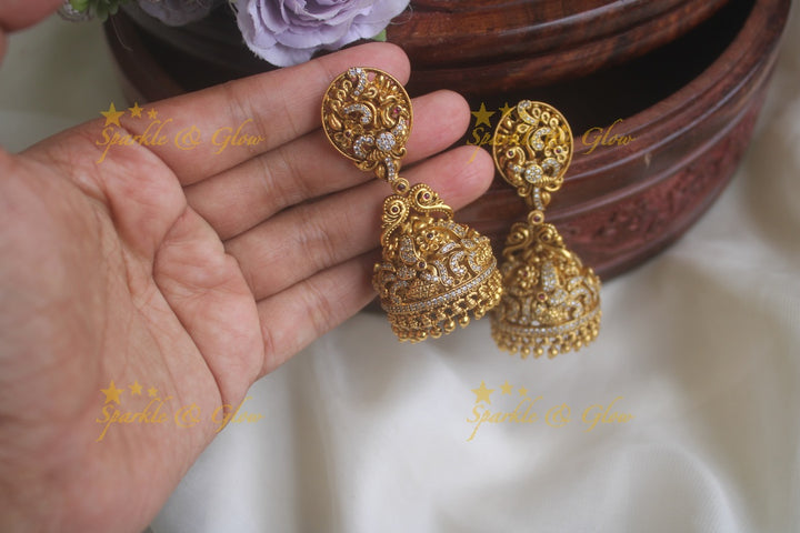 Gold alike intricate design floral jhumkas