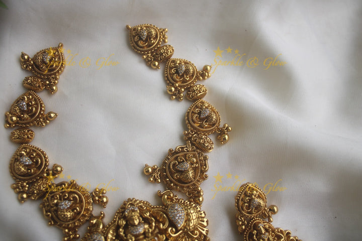 Gold alike peacock carved Lakshmi short necklace with statement earrings