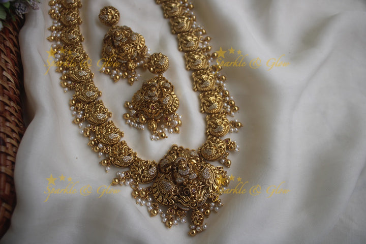 Gold alike dancing peacock carved Lakshmi long necklace