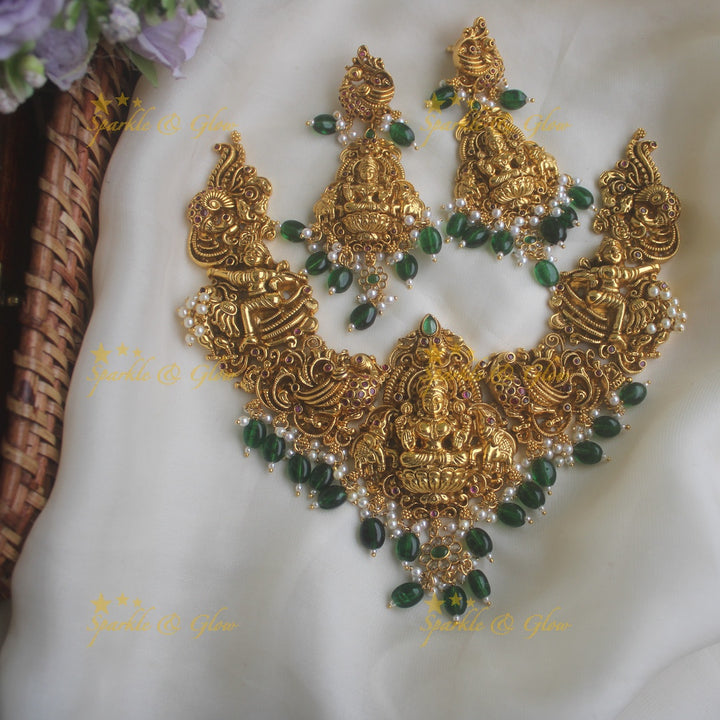 Glorious lakshmi carved peacock elephant necklace with green beads