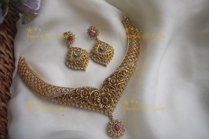 Beautiful gold alike floral necklace with beautiful earrings