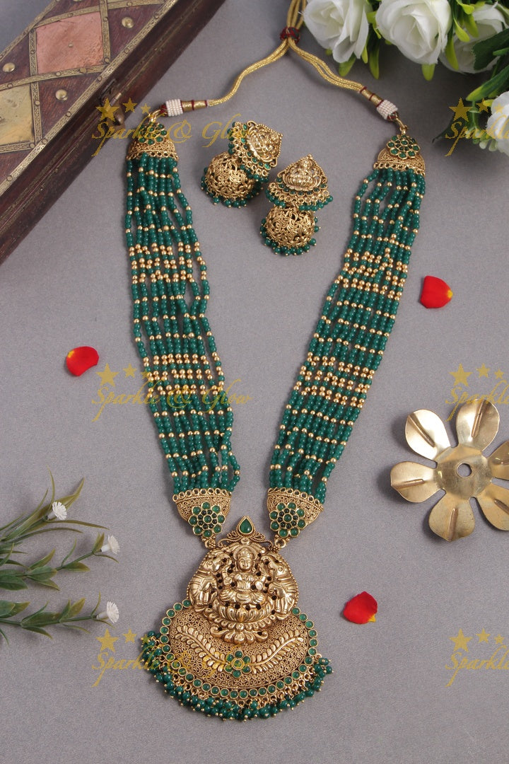 Gold alike lakshmi carved pendent multilayered pink beads necklace