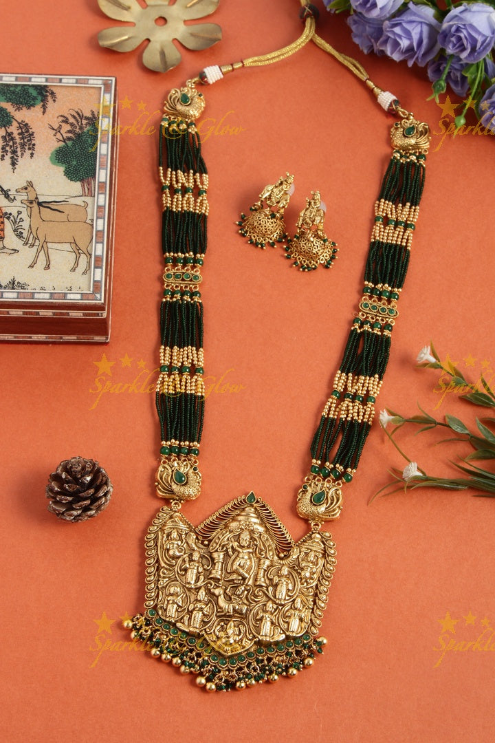 Gold alike lord krishna carved pendent multilayered white beads necklace