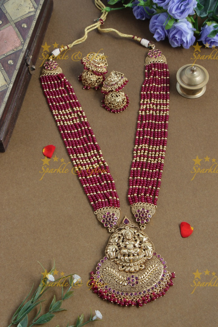 Gold alike lakshmi carved pendent multilayered pink beads necklace